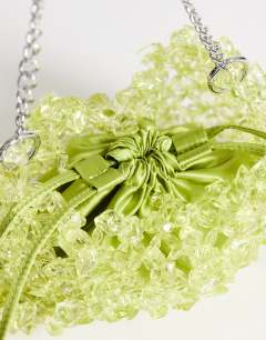 Model wearing Scarlett small beaded shoulder bag in green