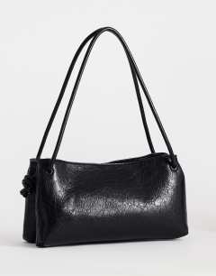 Model wearing Schelby medium flat bowler in black