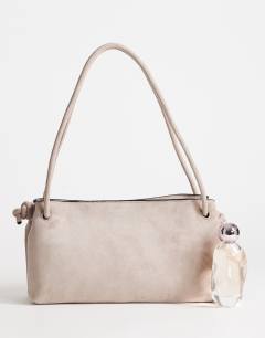 Model wearing Schelby suedette medium flat bowler in taupe