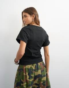 Model wearing Scoop neck sculpted t-shirt in black