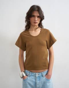 Model wearing Scoop neck sculpted t-shirt in dark olive