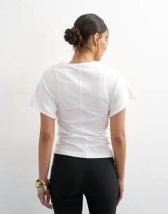 Model wearing Scoop neck sculpted t-shirt in white