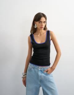 Model wearing Scoop vest with contrast mesh tipping in black and blue