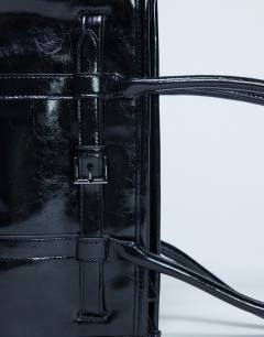 Model wearing Scottie shoulder bowler bag in black