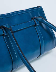 Model wearing Scottie shoulder bowler bag in teal