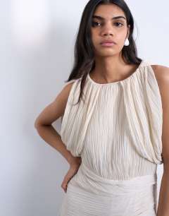 Model wearing Sculptural drape mini dress in white
