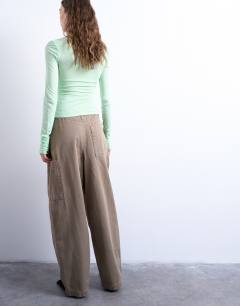 Model wearing Seam detail barrel leg trouser in mushroom