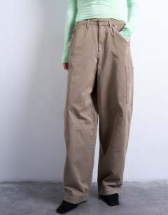 Model wearing Seam detail barrel leg trouser in mushroom