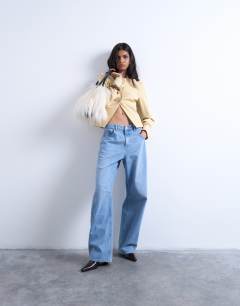 Model wearing Seam detail blazer top in buttermilk