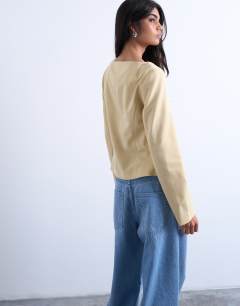 Model wearing Seam detail blazer top in buttermilk