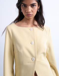 Model wearing Seam detail blazer top in buttermilk