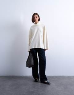 Model wearing Seam detail funnel neck skater tee in ecru