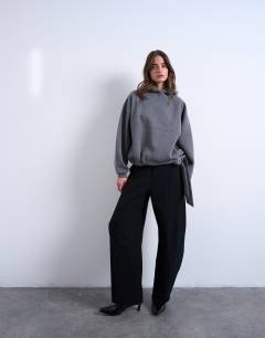 Model wearing Seam detail tie hem hoodie in charcoal marl