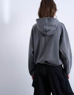 Model wearing Seam detail tie hem hoodie in charcoal marl