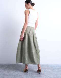 Model wearing Seamed barrel maxi skirt in sage cord