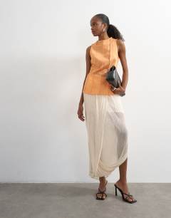 Model wearing Seamed detail high neck top in orange