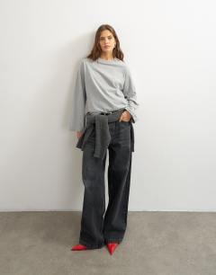 Model wearing Seamed detail long sleeve skater top in grey marl