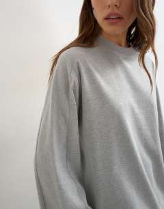 Model wearing Seamed detail long sleeve skater top in grey marl
