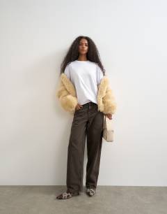 Model wearing Seamed detail long sleeve skater top in white