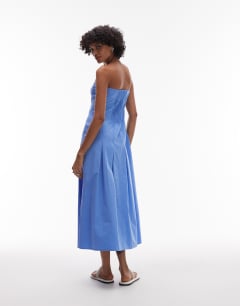 Model wearing Seamed detail midi bandeau dress in dusty blue