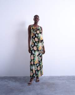Model wearing Seamed high cowl neck maxi dress in vibrant vintage floral