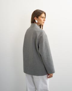 Model wearing Self frogging formal blazer coat in grey