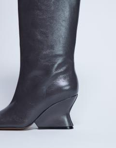 Model wearing Selma Premium leather knee high wedge boot in grey