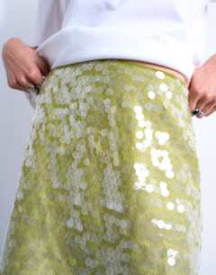 Model wearing Sequin a line mini skirt in green