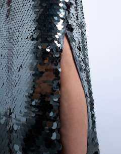 Model wearing Sequin column midi skirt in green