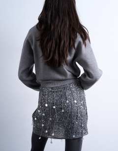 Model wearing Sequin mini skirt in grey