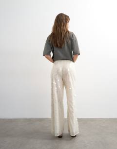 Model wearing Sequin tailored trouser in white