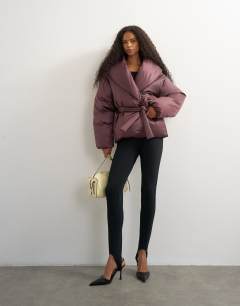 Model wearing Shawl neck belted padded jacket in fig
