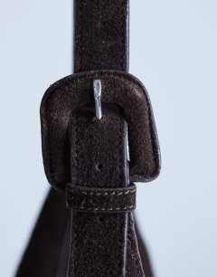 Model wearing Shayla real suede shoulder bag in chocolate