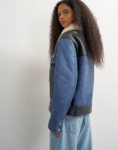 Model wearing Shearling belted biker jacket in blue