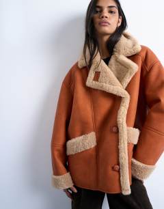 Shearling oversized car coat in tan and cream