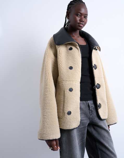 Topshop shearling oversized reversible coat with button loop in black and cream - view 1