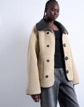 Topshop shearling oversized reversible coat with button loop in black and cream