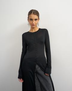 Model wearing Sheer button down long line top in black