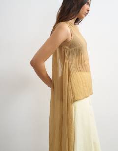 Model wearing Sheer cape detail top in mocha