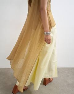 Model wearing Sheer cape detail top in mocha