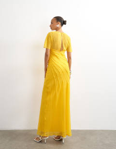 Model wearing Sheer chiffon maxi dress with pintuck details in Marigold