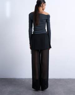 Model wearing Sheer double layer mock skirt trouser in black