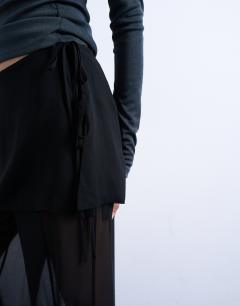 Model wearing Sheer double layer mock skirt trouser in black