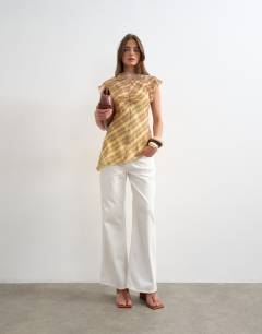 Model wearing Sheer drape neck top in warped pastel check
