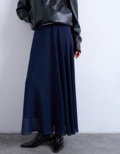 Model wearing Sheer full circle chiffon maxi skirt in navy