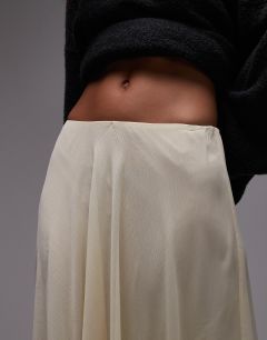 Model wearing Sheer full circle chiffon skirt in buttermilk