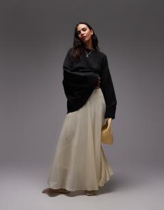 Model wearing Sheer full circle chiffon skirt in buttermilk