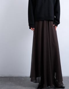 Model wearing Sheer full circle maxi skirt in chocolate