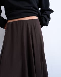 Model wearing Sheer full circle maxi skirt in chocolate