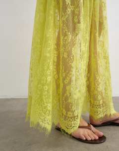 Model wearing Sheer lace maxi skirt in lime green